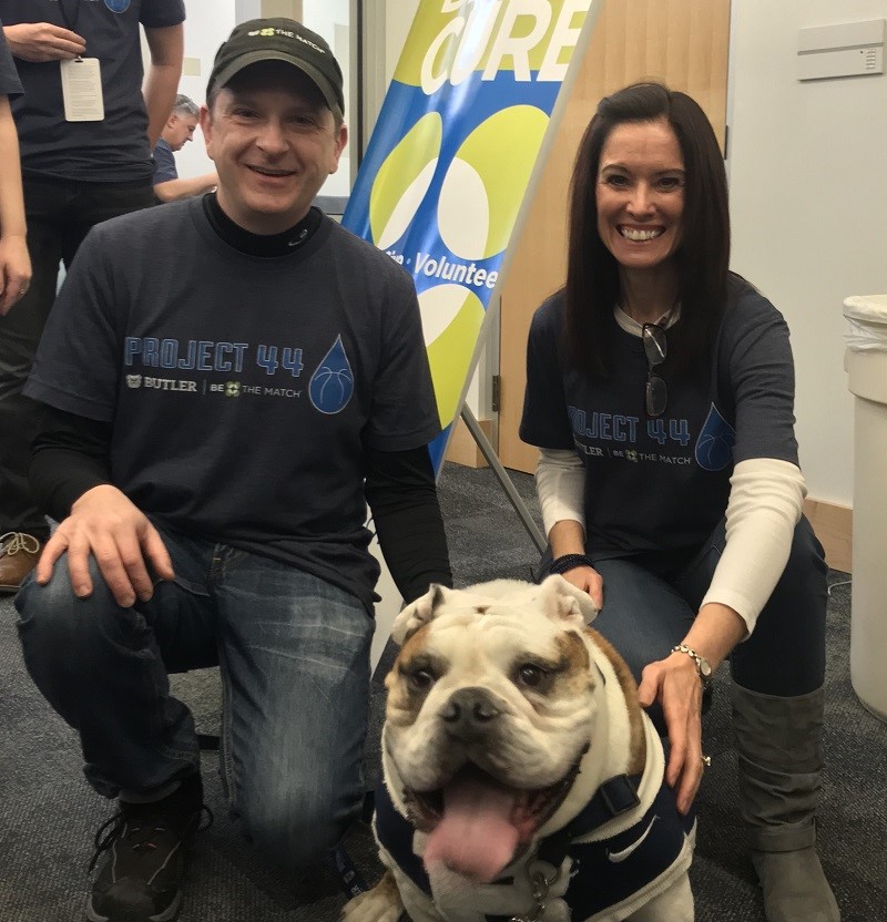 Laura, blood stem cell donor, with her husband, Michael and Butler Blue, mascot for Butler University