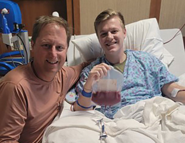 Rob transplant recipient alongside his son Michael